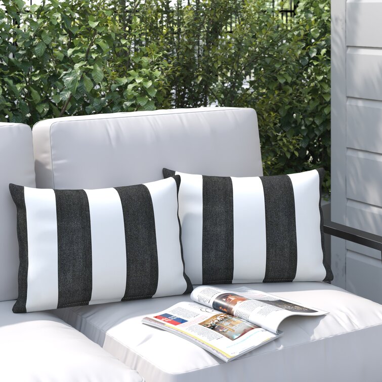 Black and white shop striped outdoor cushion